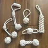 Japón y Corea del Sur para cuerda de mordida para perros cuerda de algodón beige cuerda tejida molares resistentes a la mordida nuevos juguetes para perros traje juguetes para mascotas venta al por mayor