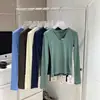 Momo Nuo Nuo Mismo Estilo Multicolor Cuello Alto Manga Larga Camiseta Básica Ropa para Mujer Otoño Temprano 2026 Camiseta Top Color Sólido Versátil Tejido