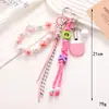 Versión Coreana del Nuevo Colgante de Cuerda Trenzada Dopamina Raqueta de Tenis de Mesa de Gama Alta Colgante para Teléfono Móvil Colgante de Bolso Pequeño Regalo