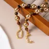 Collar con Cuentas de Piedra Ojo de Tigre Natural Estilo Melard Transfronterizo Perla de Cristal Accesorios para Mujer Collar de Clavícula de Alta Gama