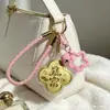 Nuevo Llavero de Trébol de Cuatro Hojas para Gastar Dinero Buena Suerte Hazte Rico Colgante de Bolsa de Trébol de Cuatro Hojas Regalo Creativo de Dibujos Animados