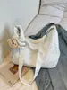 Cross2026 Nueva Moda Casual de Primavera Estilo Coreano Bolsos de Nicho para Mujer Bolso Cruzado de Hombro Único Bolso Dumpling para Viajar al Trabajo
