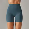 Pantalones de yoga de estilo nuevo sin línea de vergüenza color piel para mujer, cintura alta, realce de glúteos, compresión abdominal, shorts deportivos de tres puntos