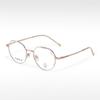 Gafas de montura ovalada pequeña y fresca, pegamento dorado de moda T22055, semi-titanio, se pueden equipar con montura óptica para miopía, anti-luz azul