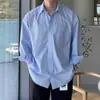 Camisa de hombre de alta gama Tommy para primavera y otoño, de manga larga, estilo coreano, camisa casual azul juvenil