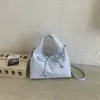 Bolsa Feminina Tendência 2026 Primavera Novo Estilo Fashion e Única Casual Ombro Transversal Texturizada Tendência Bolsinha de Axila para Mulheres