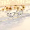 Brincos de argola dourados com laço, novo estilo minimalista, acabamento liso, delicados e versáteis para o dia a dia, brincos femininos