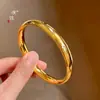 Mismo estilo que Puzuo Gold Shop pulsera de círculo liso con espalda de locha dorada brillante para mujer simple sensación de alta gama pulsera sólida anillo de mano de boda