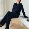 Nuevo conjunto de punto de moda otoño e invierno para mujer, con un suéter de punto trenzado holgado, suave y cómodo, y pantalones de pierna ancha, un conjunto de dos piezas y un material grueso