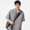 Camisa Plaid Plegada de Manga Corta Estilo Hong Kong 2026 para Hombre, Nueva Tendencia de Verano Ciboy Holgada Casual