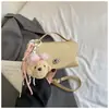 Bolsa Quadrada Pequena de Mão Transfronteiriça Nova Primavera 2026 Fivela Leve de Luxo Moda Transfronteiriça Elegante Bolsa de Mão Feminina Bolsa de Ombro