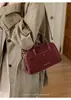Bolso almohada retro para mujer, nuevo y moderno 2026, bolso de mano y cruzado casual versátil para otoño, bolso de hombro de alta gama