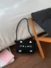 Bolsa Feminina Fofa 2026 Nova Primavera Nicho Super Popular Bolsa de Ombro para Axila para Trabalho Deslocamento Transversal Pequena Quadrada