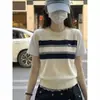 Conjunto de verano estilo coreano: Camiseta de manga corta de dos piezas falsas a rayas de albaricoque para mujer, top holgado super popular 2026 que reduce la edad