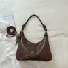 Bolsa grande de mujer Shuai Mi Jia 2026 verano nuevo elegante casual bandolera bandolera de hombro para ir al trabajo bolsa de albóndiga