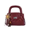 Bolso de mano de cadena con patrón de rombos estilo coreano para mujer, nuevo bolso de hombro retro de moda 2026, bolso cruzado versátil y moderno