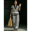 Conjunto casual de 2 peças para mulheres, estilo europeu e americano, com decote em V e estampa geométrica, apresentando calças de perna larga com corte solto, disponível para vendas transfronteiriças