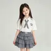 Conjunto de Saia com Gola Polo de Manga Curta para Meninas Estilo Casual College Estilo Coreano Saia Bolo Xadrez Doce Conjunto de Duas Peças