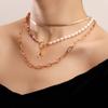 Nuevos accesorios europeos y americanos, collar tejido a mano con hilo de pescar de perlas de imitación de arroz bohemias, cadena de serpiente para mujer, estilo ins