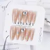 El Artículo de Moda Más Vendido de Celebridad de Internet de Xiaohongshu: Puntas de Uñas Ojo de Gato de Vidrio Dorado Champagne Ligeramente Borrachas con Tonos Rosados que Realzan el Cutis y Añaden un Toque de Lujo