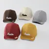 Sombrero de color sólido versátil para bebé con ala suave al por mayor nuevo sombrero solar transpirable para niño pequeño gorra de béisbol linda de cachorro para bebé
