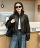 Chaqueta Corta de Cuero con Cuello Alto Nueva para Mujer Primavera y Otoño 2026, Estilo Coreano Holgada Casual Simple Unisex