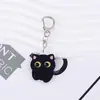 Llavero de acrílico de gato de dibujos animados, lindo colgante de gato negro, decoración de mochila, colgante transfronterizo, pequeño accesorio para llavero