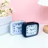 Reloj despertador silencioso para estudiantes Mesita de noche Simple Creativo Pequeño reloj para niños Dormitorio Estudiante Escritorio Reloj despertador de escritorio Venta al por mayor