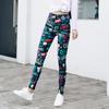 Comercio exterior fabricantes mayoristas populares primavera y otoño delgados seda de leche leggings de gran elasticidad pantalones lisos con estampado abstracto mujeres