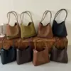 Bolso de Axila para Mujer Ruien 2026 Otoño Nuevo Vintage Nicho Patrón Tejido Bolso de Hombro Bolso Cubo para Viajes