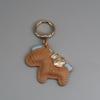 Pulsera llavero inmediatamente rica colgante de pony de dibujos animados de cuero bolsa de pareja llavero de coche de moda en internet