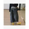 Conjunto de moda de alta gama para mujer 2026 otoño nuevo estilo top de hombros descubiertos con estampado de letras + chaleco + falda de cintura alta conjunto de tres piezas