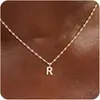 Collar Transfronterizo de Nuevo Producto Color Dorado con 26 Letras para Mujer, Moderno y Versátil, Cadena de Clavícula de Cobre de Lujo Ligero