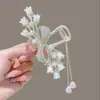 Pinza para el pelo de borla de pedrería de lirio del valle perlado, Pasador grande estilo hada de lujo ligero, Accesorio para el pelo de la celebridad de Internet con lazo, Accesorios para la cabeza al por mayor