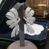 Nuevos pendientes Cao Shi SHEIN: Aretes de botón de cobre con microincrustaciones de circonita en forma de lazo para mujer, elegantes aretes con diseño de cinta