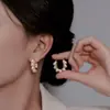 Agulha de prata S925, pérola perfumada, assimétricos, brincos de estilo natural para mulheres, com um design único e elegante, versáteis e simples, apresentando um pingente em forma de coração