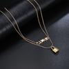 Nuevo collar exquisito de cadena de hueso de serpiente de doble capa para mujer, acero de titanio multicapa, candado pequeño hueco con letra, cadena para clavícula, joyería al por mayor
