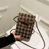 Bolsos populares para mujer este año 2026 otoño e invierno nuevo de moda bolso de teléfono a cuadros de un solo hombro diseño de nicho bolso cruzado