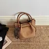 Bolso Moda Textura Viaje Bolso de Hombro Único Cubo Bolso Cruzado Madre-Hija 2026 Otoño Portátil Moderno Elegante Nuevo Coreano