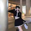 Traje social estilo xiaoxiang feminino verão filha rica cardigã curto de tricô casaco saia plissada conjunto de duas peças