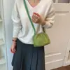 Bolso de diseño nicho coreano principios de otoño 2026 bolso cubo color sólido vintage bolso de mano para el día a día bolso bandolera para el trabajo