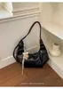 Bolso de hombro para mujer, bolso cruzado vintage de retazos plisados para debajo del brazo, nuevo bolso de bola de masa de cuero PU suave de nicho de alto valor 2026