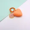Lindo Llavero Corazón de Melocotón de Resina con Cara Sonriente Anillo de Metal Colorido Accesorios para Llaves Accesorios de Joyería Decorativos Colgante