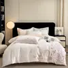 Juego de cama de lujo y elegante de cuatro piezas 100% algodón de fibra larga de Xinjiang, hecho completamente de algodón puro, con diseños florales y bordados de alta gama, adecuado para madres y bebés