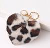 Chaveiro de bola de pelúcia de leopardo europeu e americano, pingente de bola de pelo, presente criativo, atacado