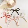 Colgante de clip con lazo de color sólido de aspecto elegante para teléfono móvil, cadena de pulsera corta, funda para cámara ccd, funda para auriculares