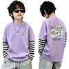 Camiseta de algodón 100% pura para niño, nueva de 2026, ropa infantil, imitación de dos piezas, manga larga, rayas, retazos, para primavera y otoño