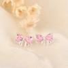 Pendientes de lazo de diamantes, pendientes coreanos súper brillantes de color rosa, pequeños pendientes de circonitas ligeras, joyería de plata de lujo de alta calidad.