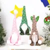Decoraciones de Navidad gorro de punto de lunares muñeca sin rostro en posición sentada decoraciones para ventana de hotel de leñador regalo