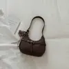 Nova bolsa de ombro estilo francês para o início do outono de 2026, bolsa de meia-lua de alto valor, bolsa de ombro simples, bolsa transversal casual estilosa, moderna